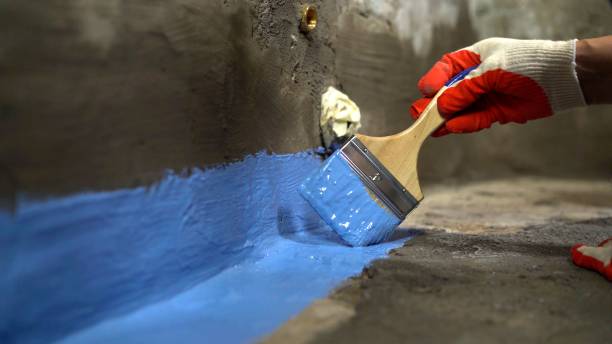 SJ Waterproofing Pros commercial waterproofing team near Lyons, MI